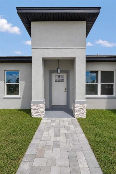 Exterior details and patio area of a home in , Ocala (Image 28).