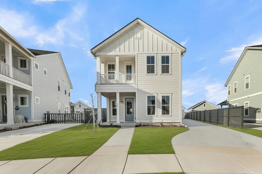Front exterior of a new home in Carnes Crossroads, Summerville, SC, highlighting curb appeal (Image 22).