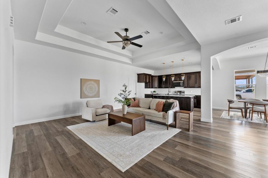 Bright entry with high ceilings and sightlines straight into the open living, dining, and kitchen areas. Bright entry with high ceilings and sightlines straight into the open living, dining, and kitchen areas.