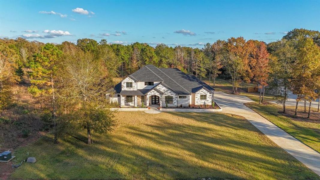 Front exterior of a new home in , Bullard, TX, highlighting curb appeal (Image 18).