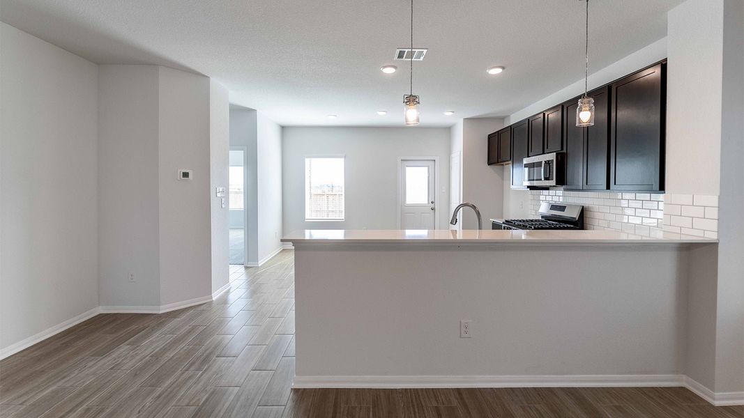 Furnished interior view inside a new home in Briarwood, Elgin (Image 3).