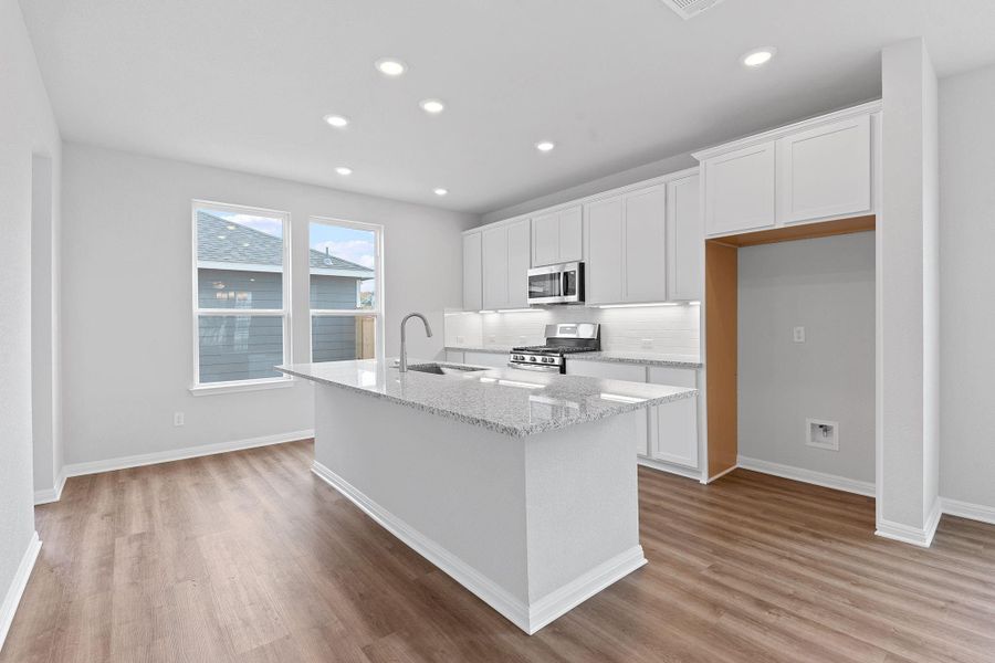 Furnished interior view inside a new home in Retreat at Hero Way, Leander (Image 9).