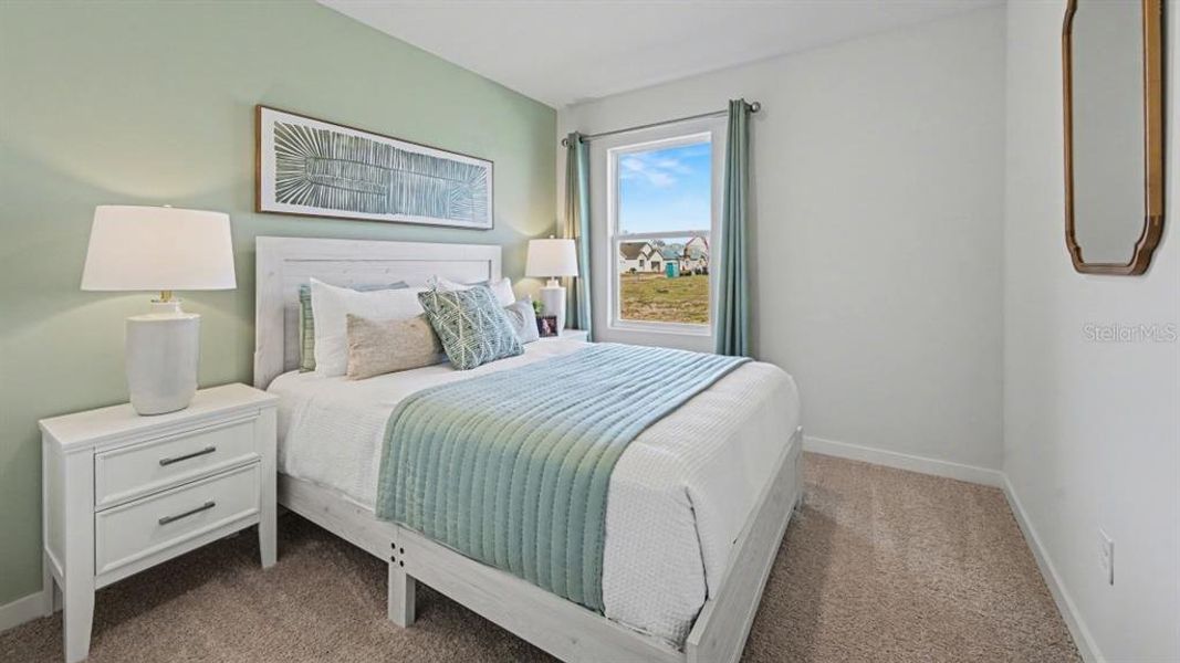 Furnished interior view inside a new home in Driftwood Bay, Port Charlotte (Image 6).
