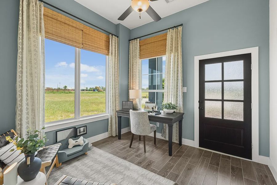 Representative furnished interior of a home built from the Countryside by Chesmar Homes in Meridiana Townhomes, Iowa Colony (Image 6).