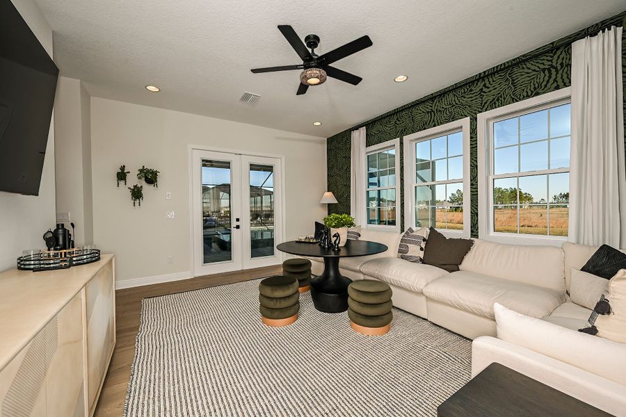 Representative furnished interior of a home built from the Key Largo II by Homes by WestBay in Barrington Preserve, Brandon (Image 8).