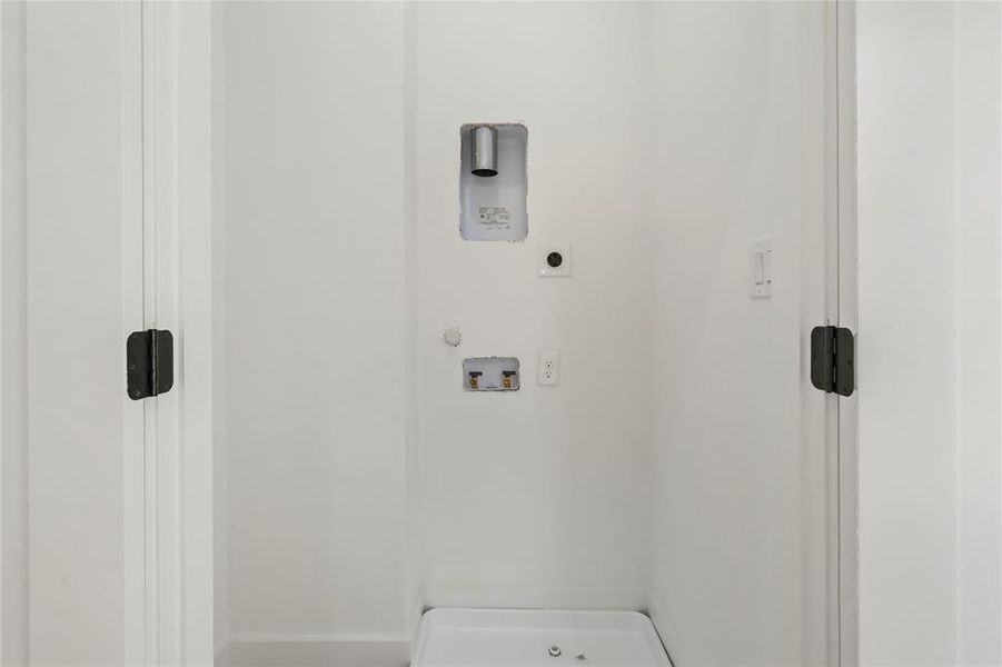 Laundry room with hookup for a washing machine