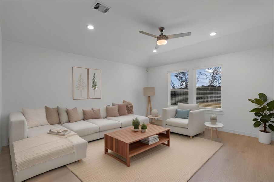 The home gets an abundant amount of natural light!! Water softener in the home, and sprinkler system!!( Virtually staged)