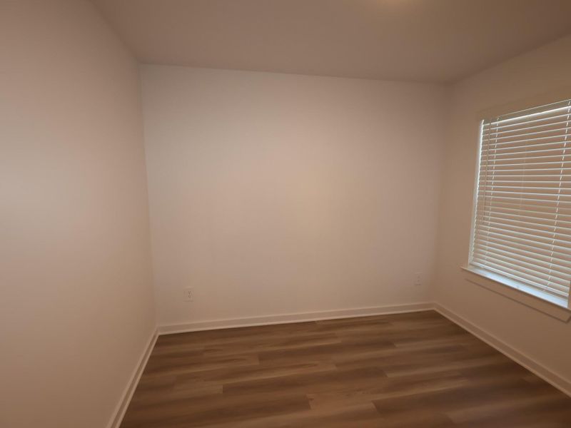 Spacious, unfurnished interior of a new home in Pinewood at Grand Texas, New Caney (Image 20).