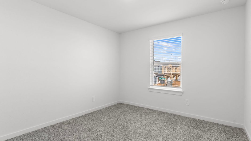 Spacious, unfurnished interior of a new home in Villarosa at Tamarron, Katy (Image 48).