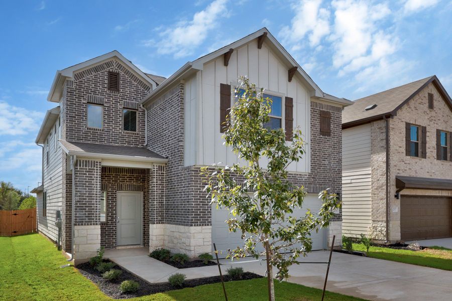 Front exterior of a new home in Trinity Ranch, Elgin, TX, highlighting curb appeal (Image 21).