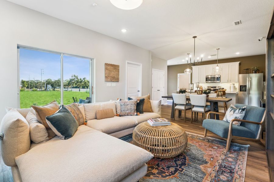 Representative furnished interior of a home built from the Campbell by Hartizen Homes in Connors Cove, Eustis (Image 5).