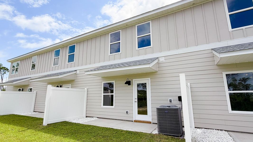 Exterior details and patio area of a home in WindMark Beach, Port Saint Joe (Image 4).