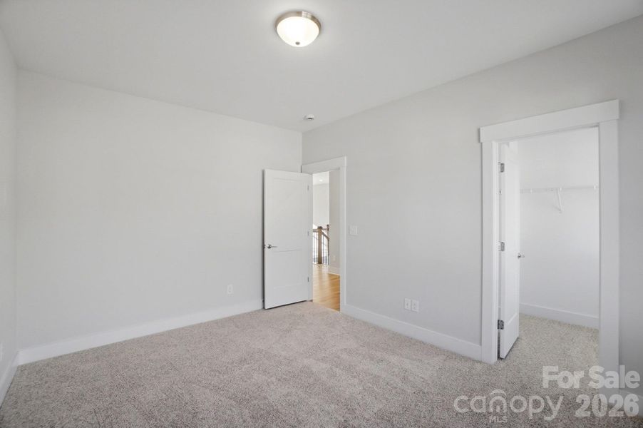 Spacious, unfurnished interior of a new home in Rone Creek, Waxhaw (Image 31).