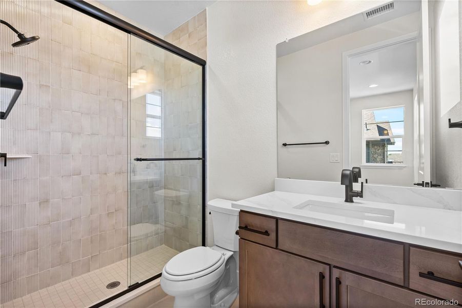 Furnished interior view inside a new home in Luxe at The Canyons, Castle Pines (Image 7).