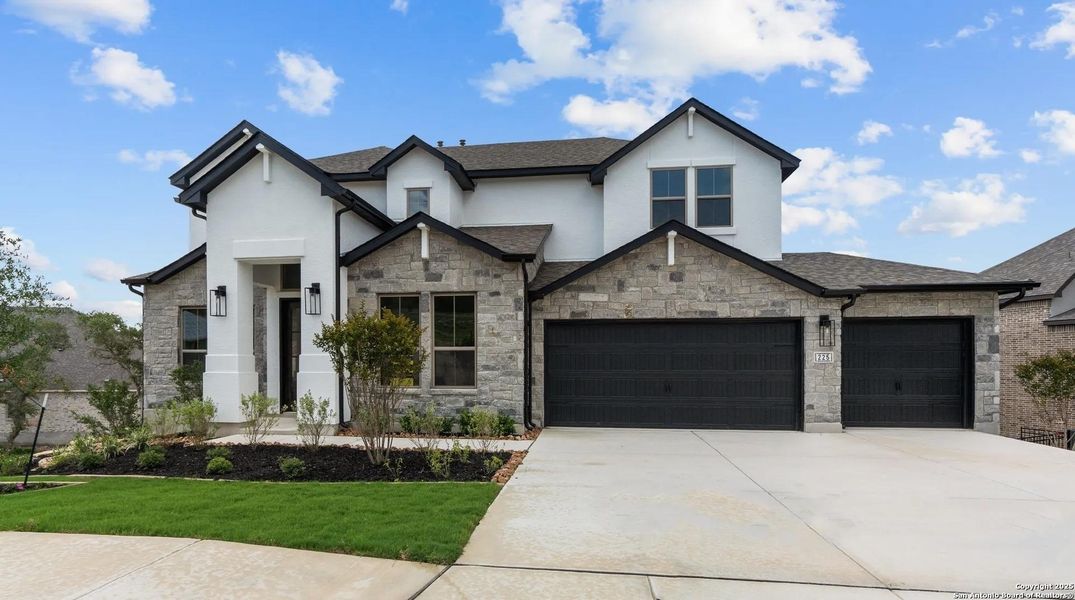 Front exterior of a new home in Esperanza - 70', Boerne, TX, highlighting curb appeal (Image 1).