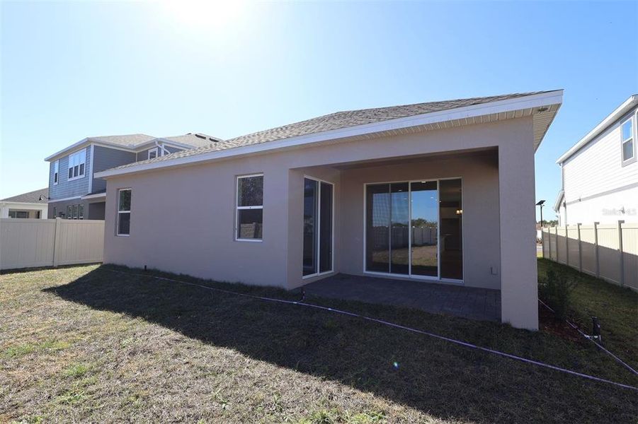 Exterior details and patio area of a home in Bay Lake Farms, St. Cloud (Image 21).