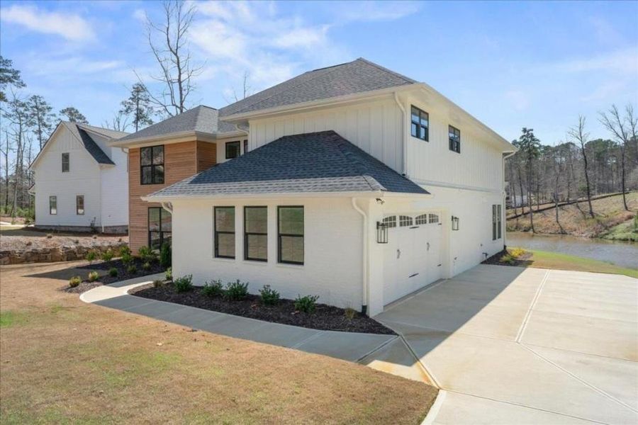 Front exterior of a new home in , Greensboro, GA, highlighting curb appeal (Image 26).