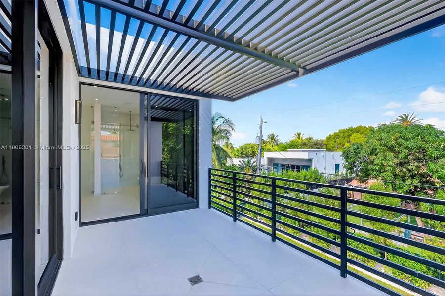Exterior details and patio area of a home in , Miami Beach (Image 4). Exterior details and patio area of a home in , Miami Beach (Image 4).