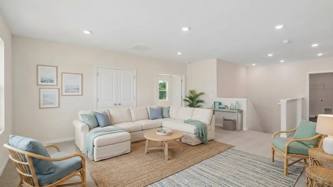 Representative furnished interior of a home built from the Holden by D.R. Horton in Deerbrook, Land O' Lakes (Image 9).