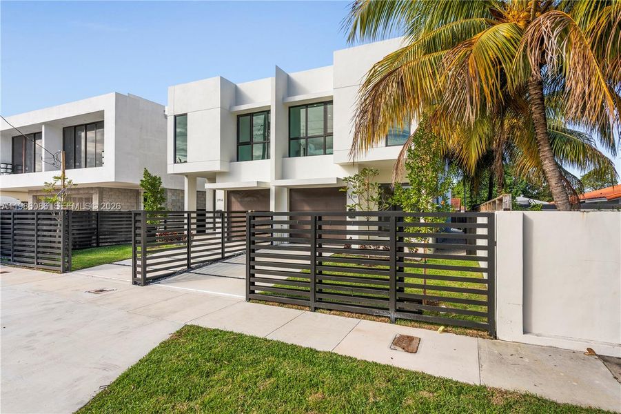 Front exterior of a new home in , Miami, FL, highlighting curb appeal (Image 2). Front exterior of a new home in , Miami, FL, highlighting curb appeal (Image 2).