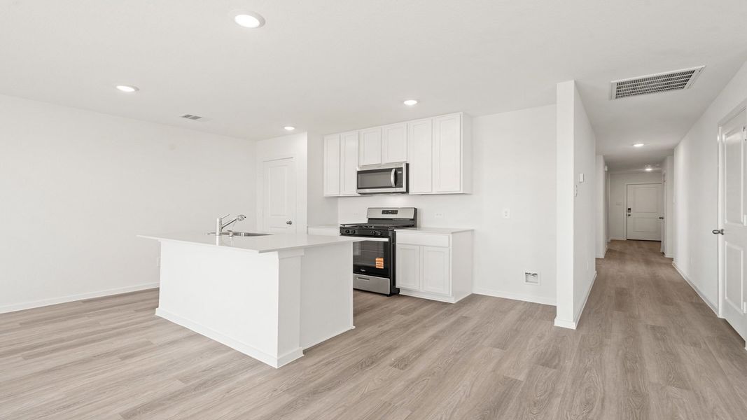 Furnished interior view inside a new home in Sunterra Lakes, Brookshire (Image 6).