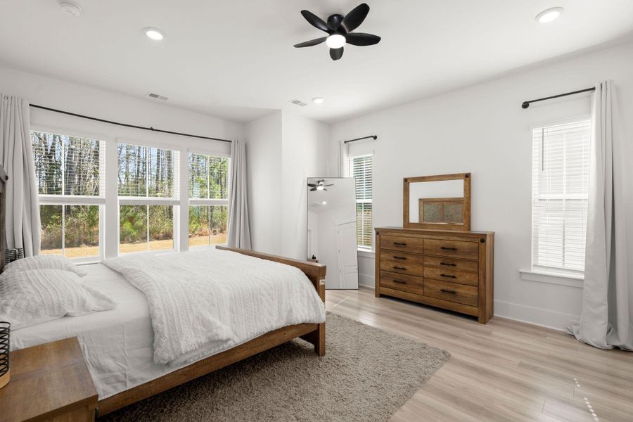 Furnished interior view inside a new home in Summerwind Crossing at Lakes of Cane Bay, Summerville (Image 29).