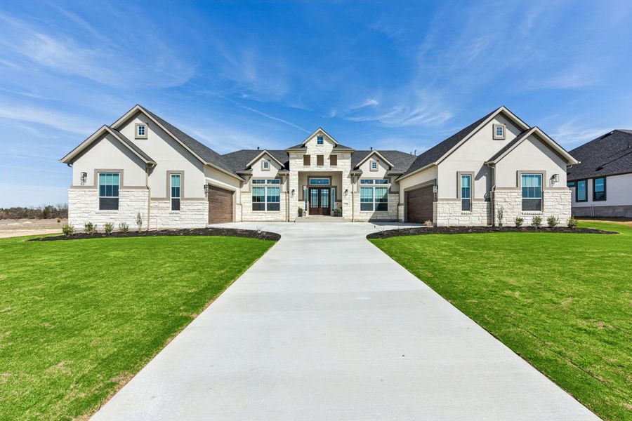 Front exterior of a new home in Feathergrass, Florence, TX, highlighting curb appeal (Image 32).