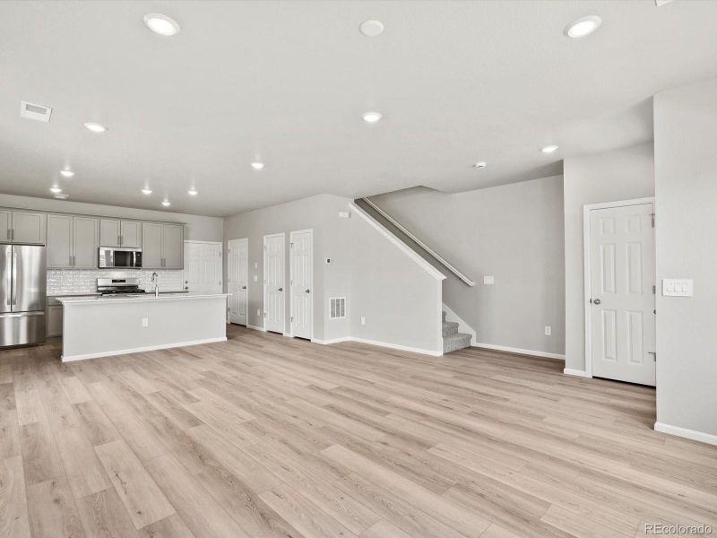 Spacious, unfurnished interior of a new home in Horizon Uptown: The Meadow Collection, Aurora (Image 15). Spacious, unfurnished interior of a new home in Horizon Uptown: The Meadow Collection, Aurora (Image 15).