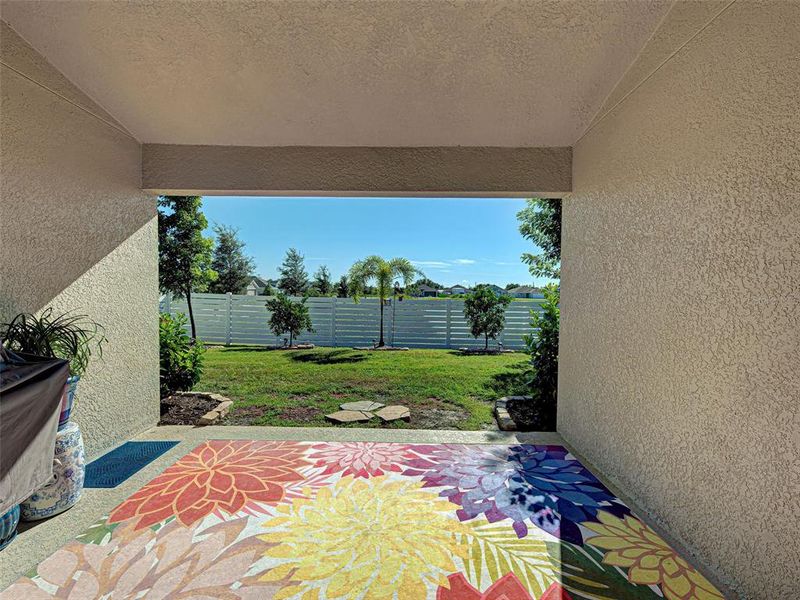 Exterior details and patio area of a home in Watercress Cove, North Port (Image 26).
