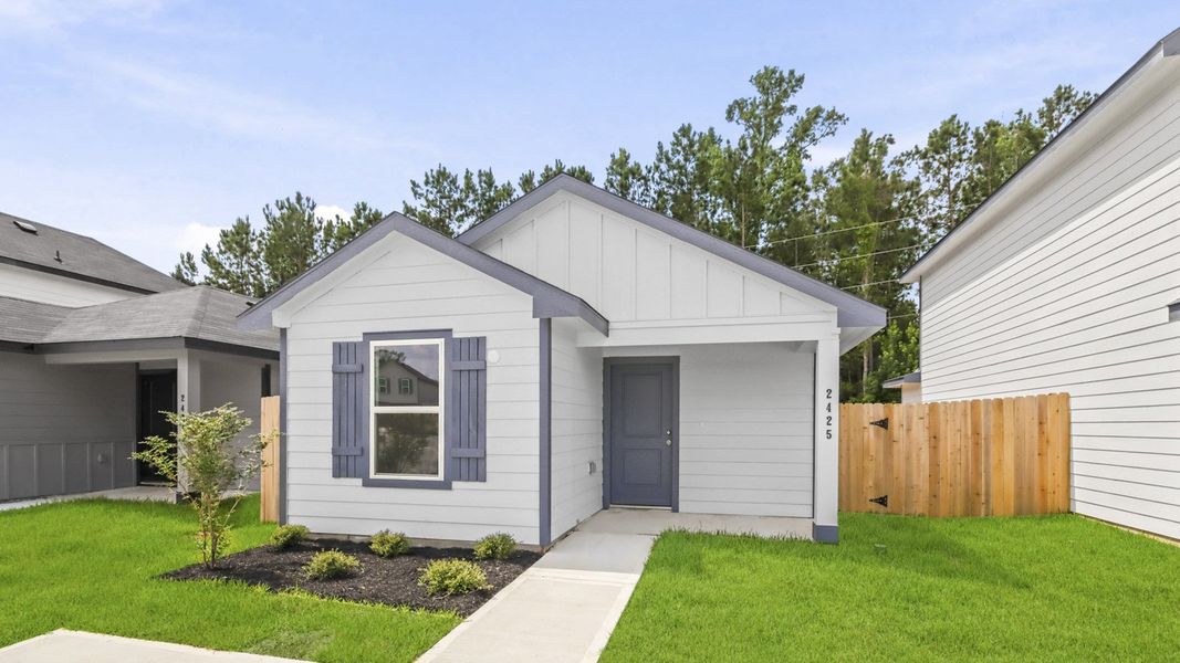 Front exterior of a new home in Gemini, Splendora, TX, highlighting curb appeal (Image 2). Front exterior of a new home in Gemini, Splendora, TX, highlighting curb appeal (Image 2).