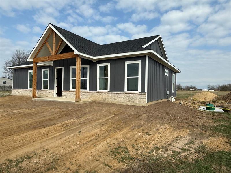 View of front facade with a deck