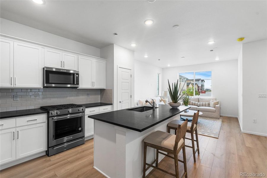 Furnished interior view inside a new home in Painted Prairie, Aurora (Image 7).