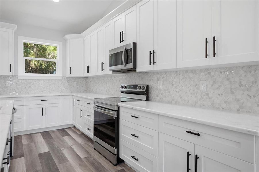 Furnished interior view inside a new home in , Port Charlotte (Image 11).