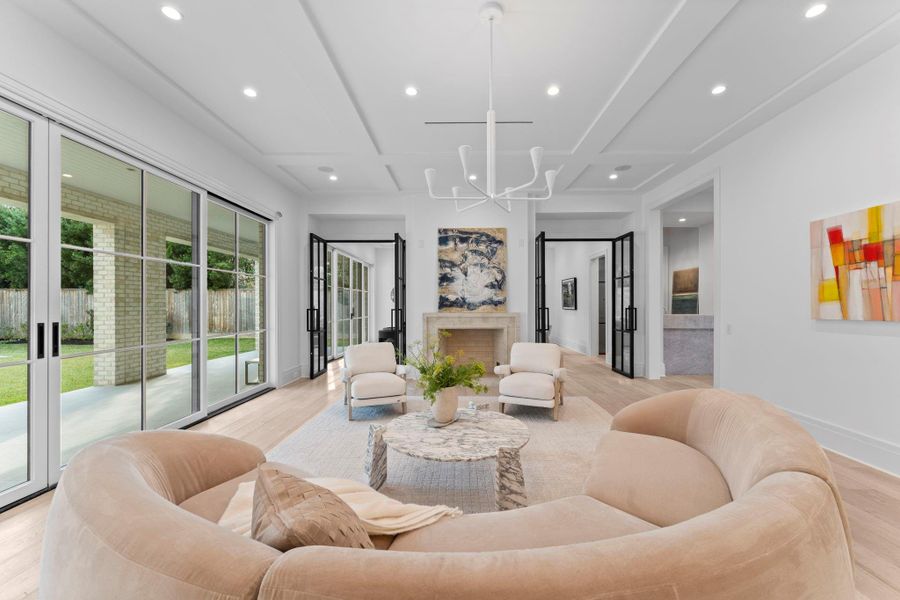 Additional view of the great home, showcasing the stunning gas log fireplace with access to the panoramic sliding glass doors Additional view of the great home, showcasing the stunning gas log fireplace with access to the panoramic sliding glass doors