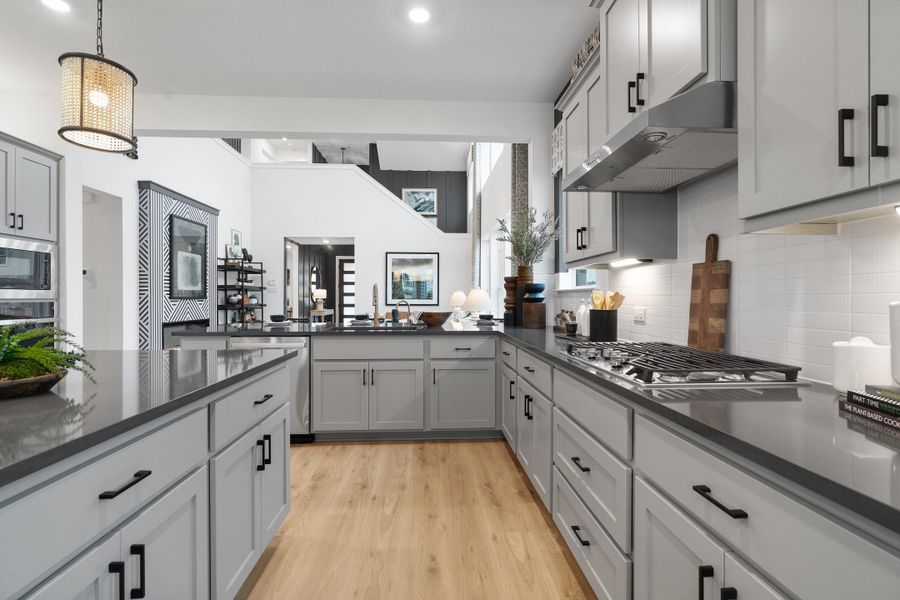 Furnished interior view inside a new home in The Grove at Blackhawk, Pflugerville (Image 42). Furnished interior view inside a new home in The Grove at Blackhawk, Pflugerville (Image 42).