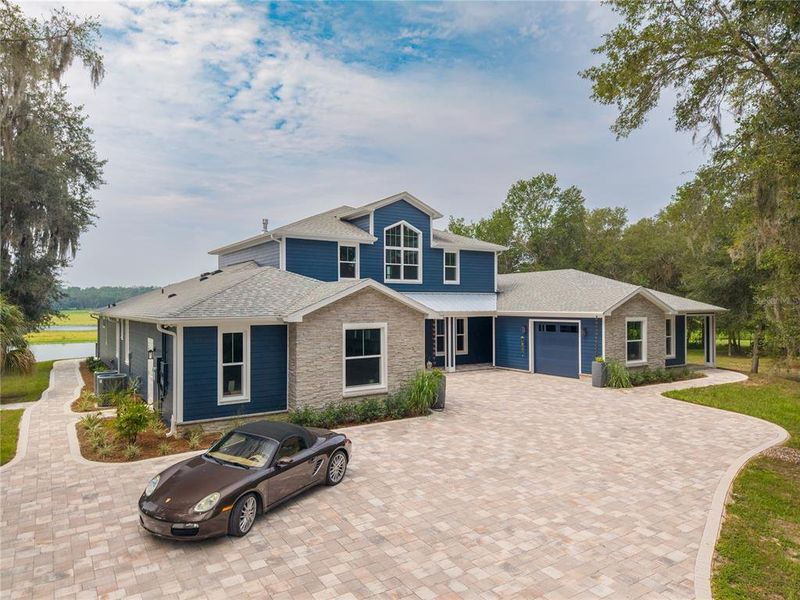 Front exterior of a new home in , Brooksville, FL, highlighting curb appeal (Image 23). Front exterior of a new home in , Brooksville, FL, highlighting curb appeal (Image 23).