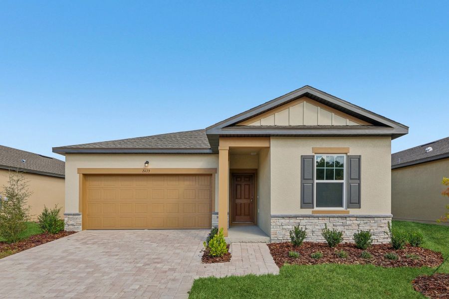 Representative exterior photo of a completed home built from the Moonbeam by Starlight Homes in Hawks Run, Kissimmee, FL (Image 1).