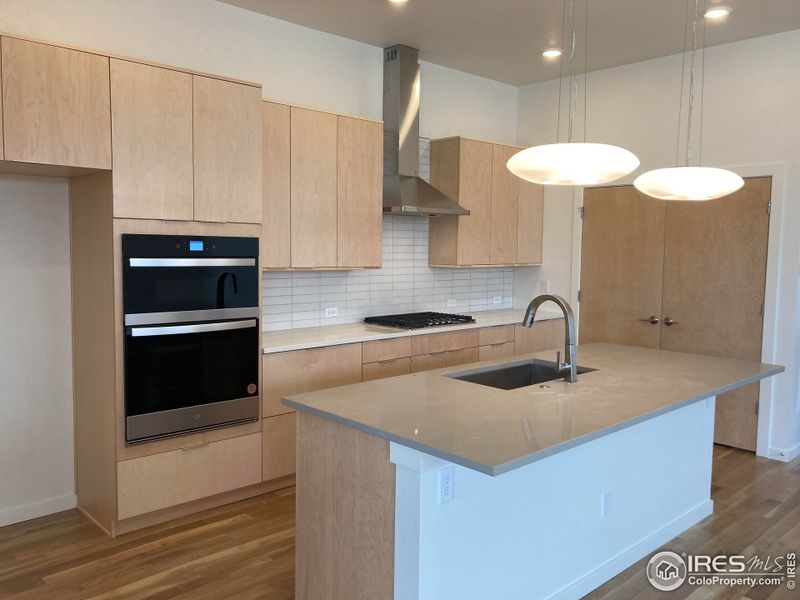 Modern Kitchen with pantry, open to living & dining area