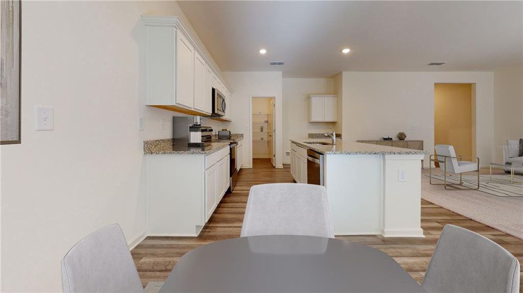 Furnished interior view inside a new home in Vista Walk, Dade City (Image 4).