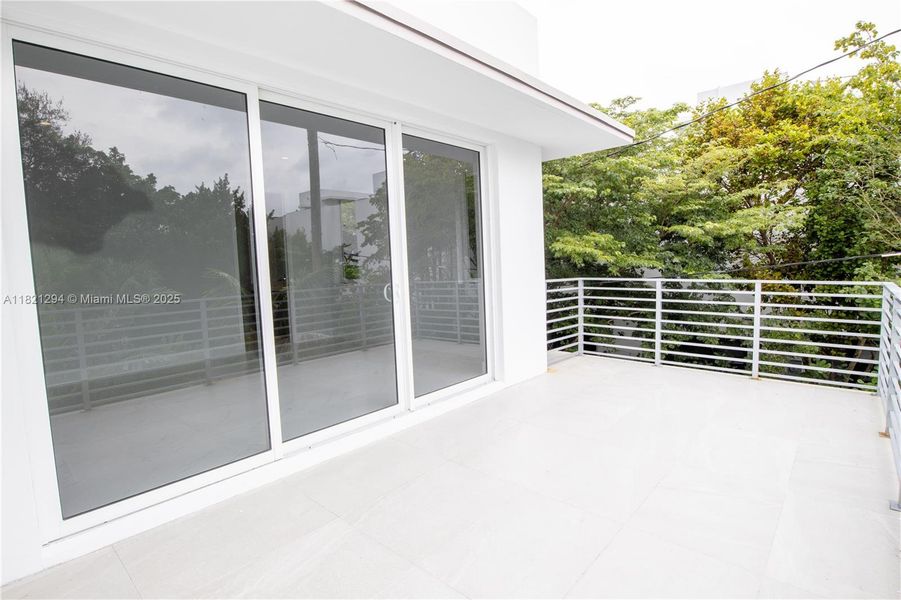 Exterior details and patio area of a home in , Miami (Image 3).