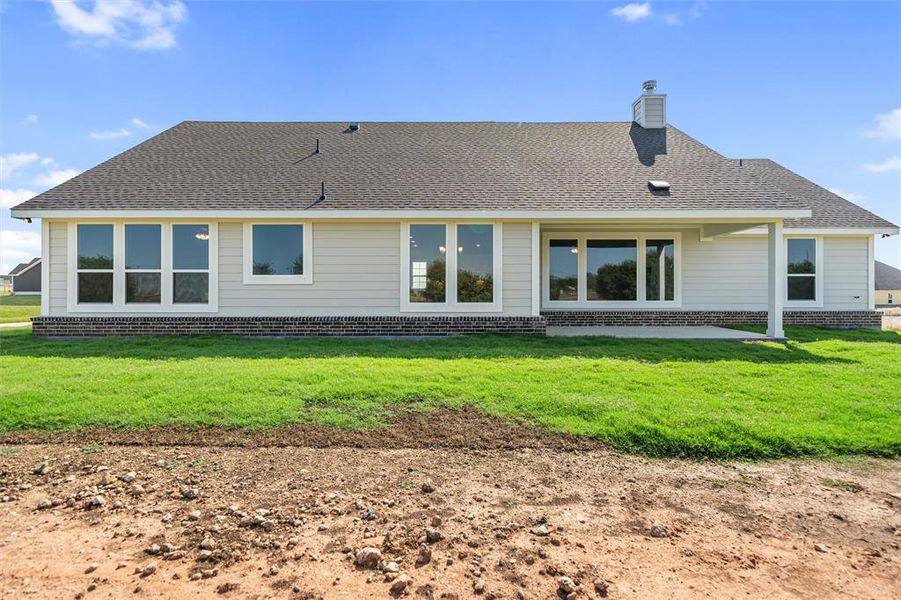 Front exterior of a new home in Fairview Meadows, New Fairview, TX, highlighting curb appeal (Image 2). Front exterior of a new home in Fairview Meadows, New Fairview, TX, highlighting curb appeal (Image 2).
