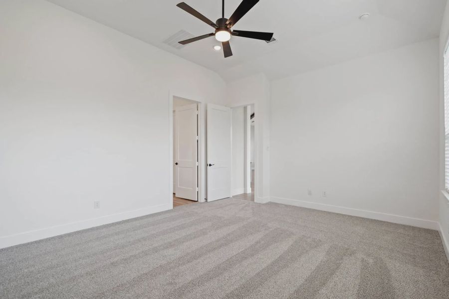 Representative unfurnished interior of a home built from the Malibu by Chesmar Homes in Fulshear Lakes, Fulshear (Image 29).