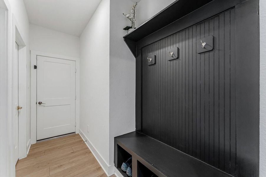 Mud bench convenient to garage entry