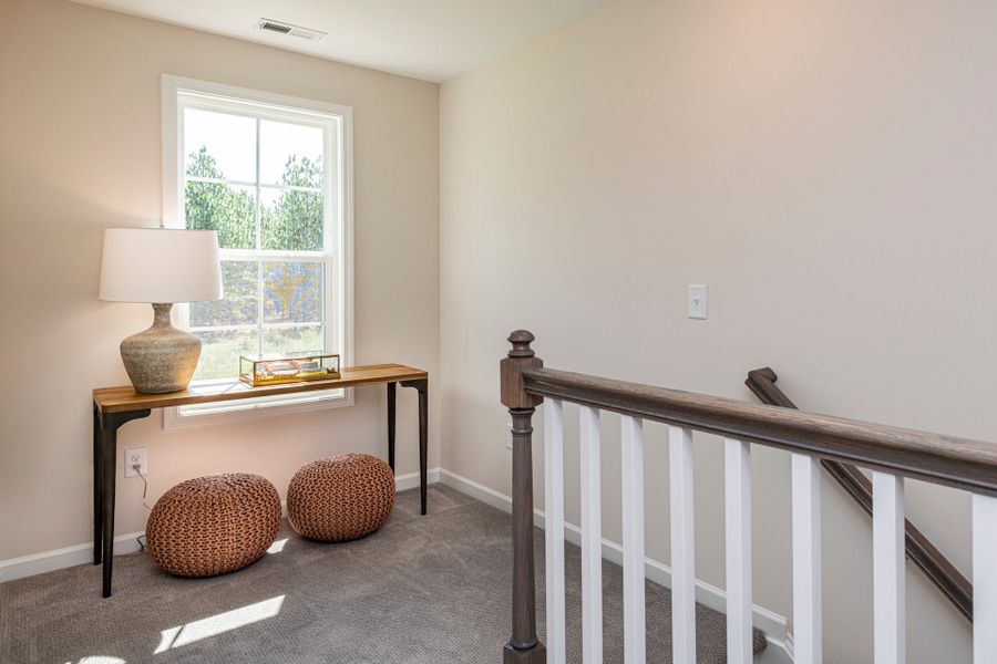 Representative furnished interior of a home built from the Winston by McKee Homes in Coventry Woods, Fayetteville (Image 15).