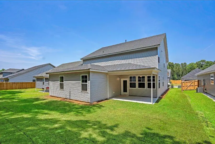 Exterior details and patio area of a home in Creek Pointe, Moncks Corner (Image 3).