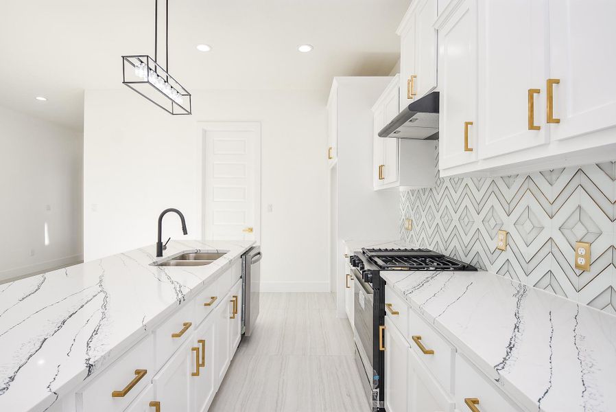 Ample built-in custom cabinetry provides plenty of storage.