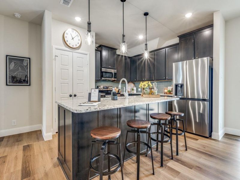 Photos shown are representative of similar construction and may include optional upgrades. Actual home may vary. Photos shown are representative of similar construction and may include optional upgrades. Actual home may vary.