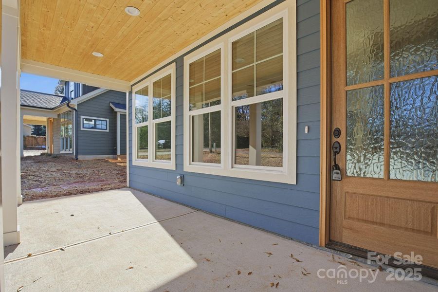 Exterior details and patio area of a home in , Belmont (Image 3).