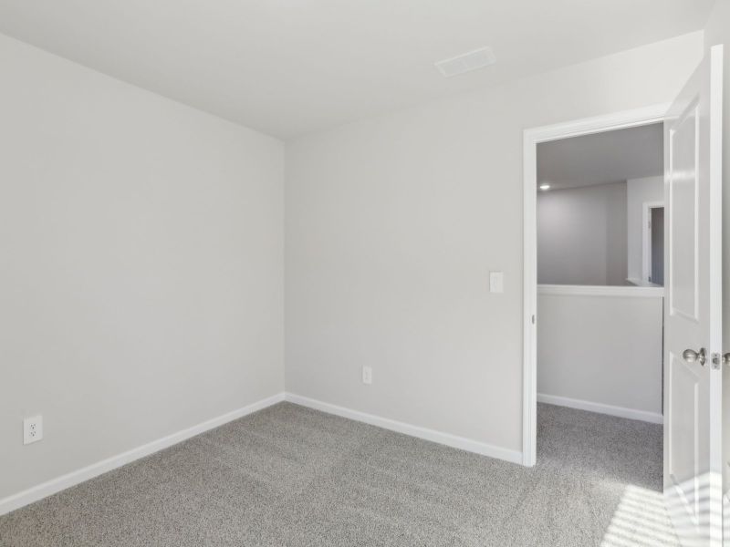 Secondary bedroom in the Dakota floorplan at 199 White Birch Lane.