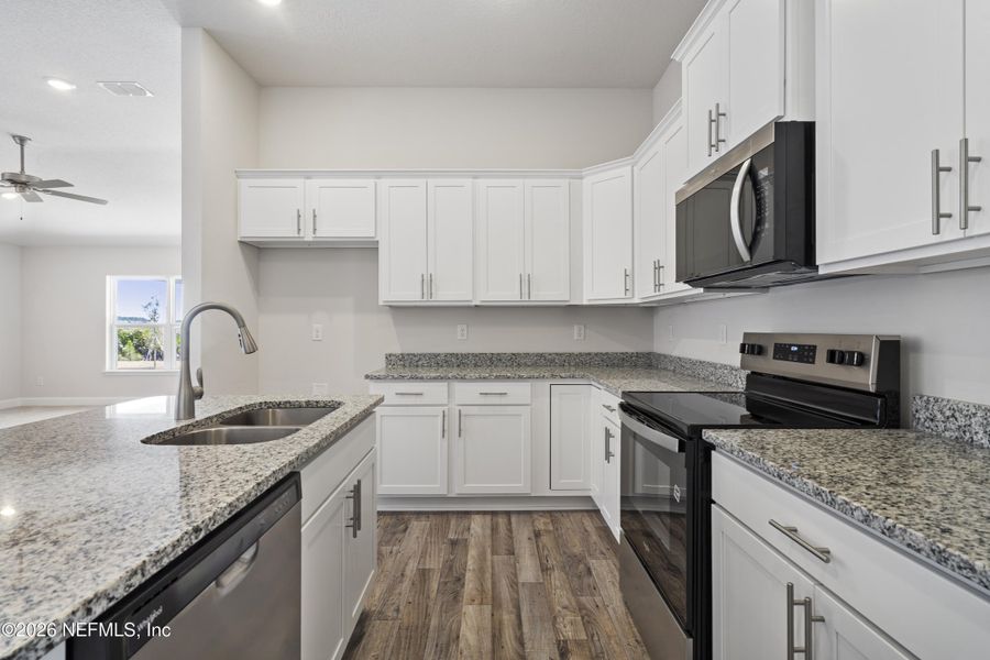 Furnished interior view inside a new home in Shadow Crest at Rolling Hills, Green Cove Springs (Image 9).